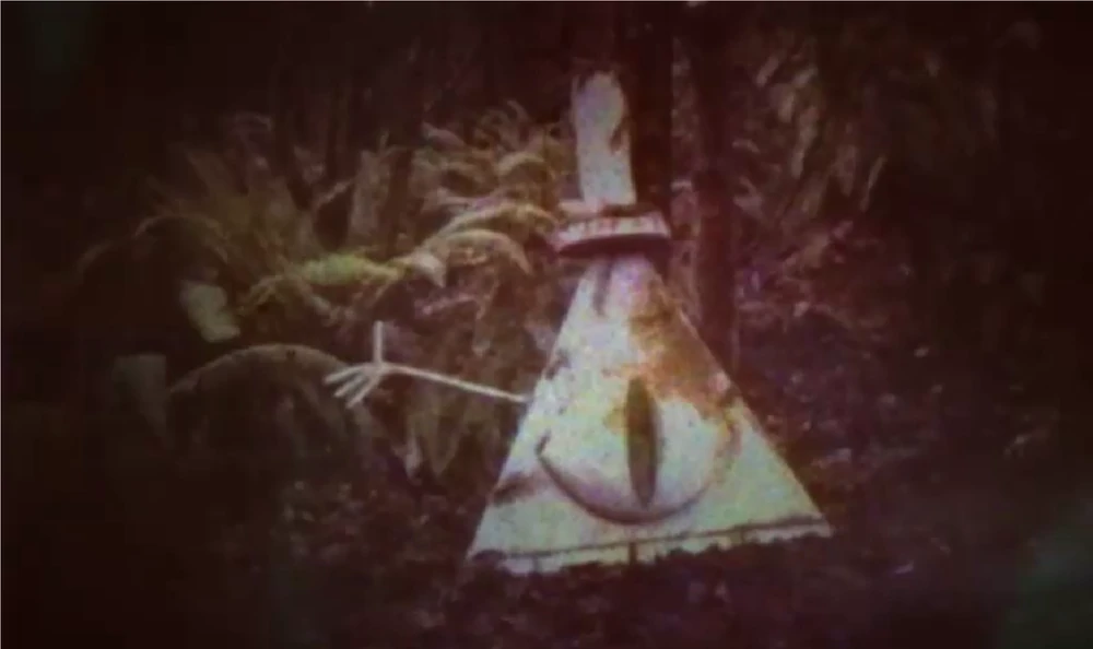 Estatua de Bill Cypher en mitad del bosque.